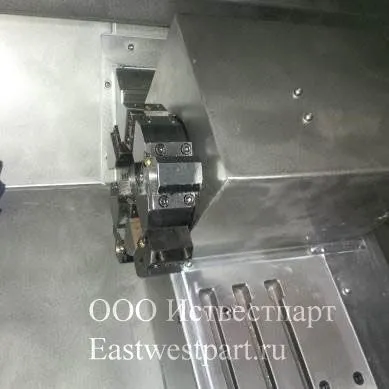  Револьверная головка на 6 позиций с электроприводом.